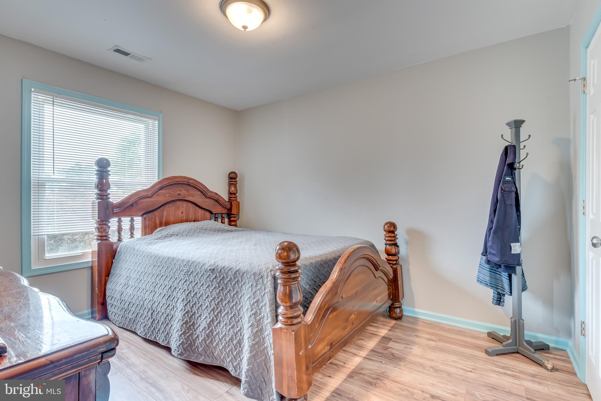 80 Hickory Lane Ranson, WV 25438 - Photo 20 of 44 Bedroom 2 features overhead light, updated floors,