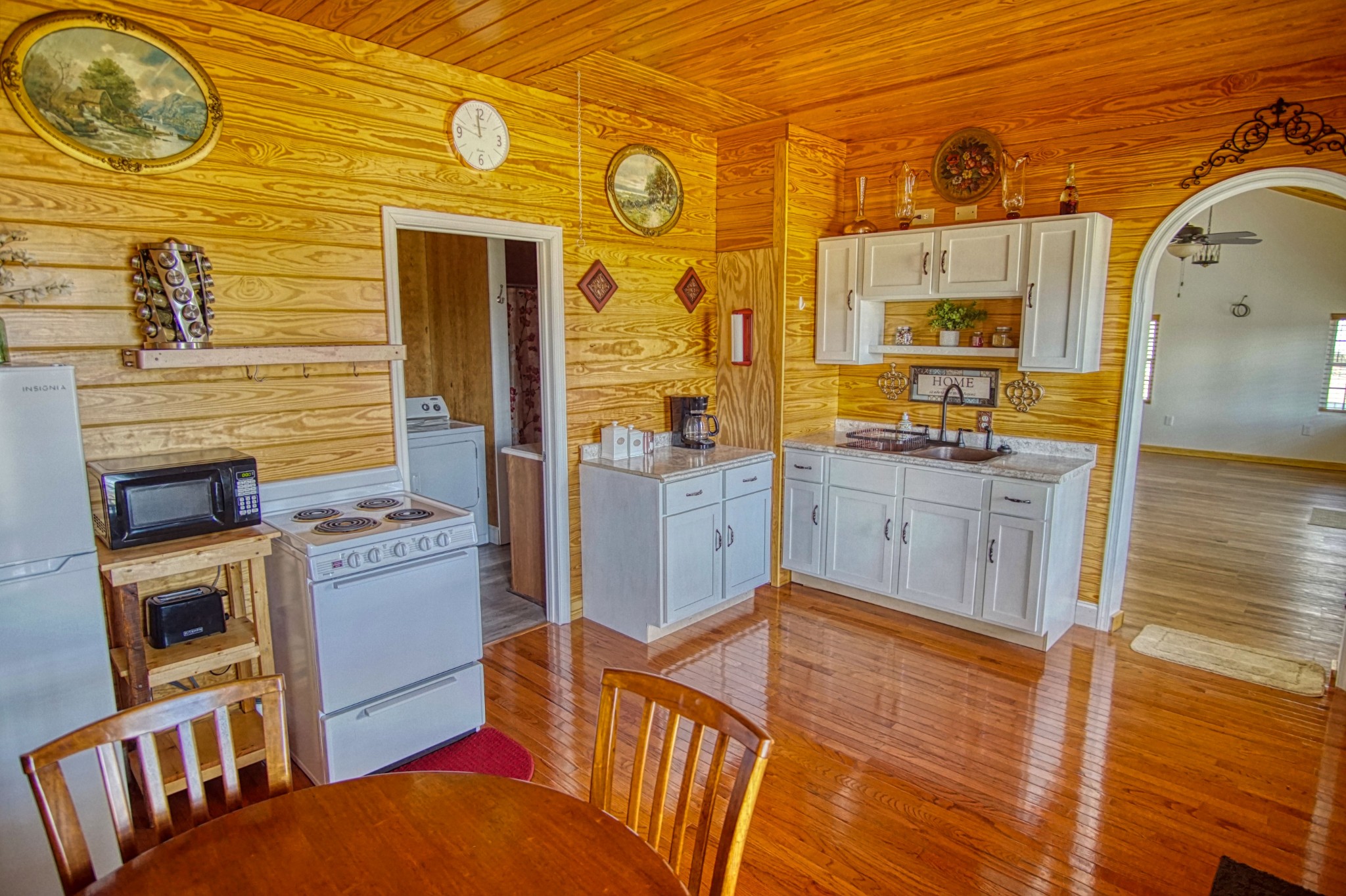 490 Vanntown Road Elora, TN 37328 - Photo 4 of 20 a kitchen with stainless steel appliances granite countertop a stove a sink and a refrigerator