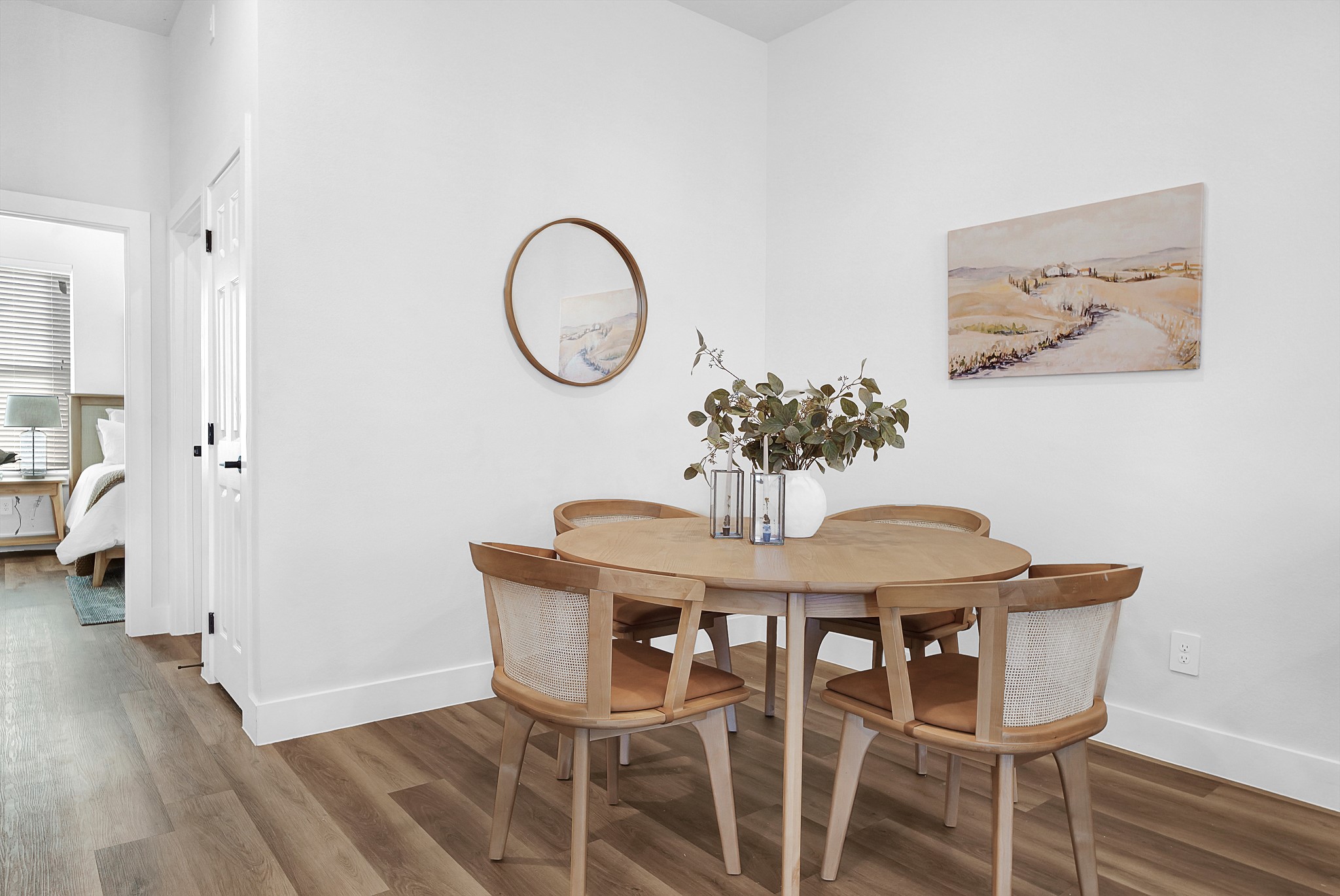 38634 Spur 149 Road, Unit 72A Magnolia, TX 77354 - Photo 8 of 48 a view of a dining room with furniture and wooden floor