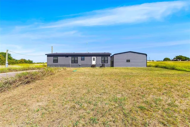 a view of a swimming pool with an ocean view