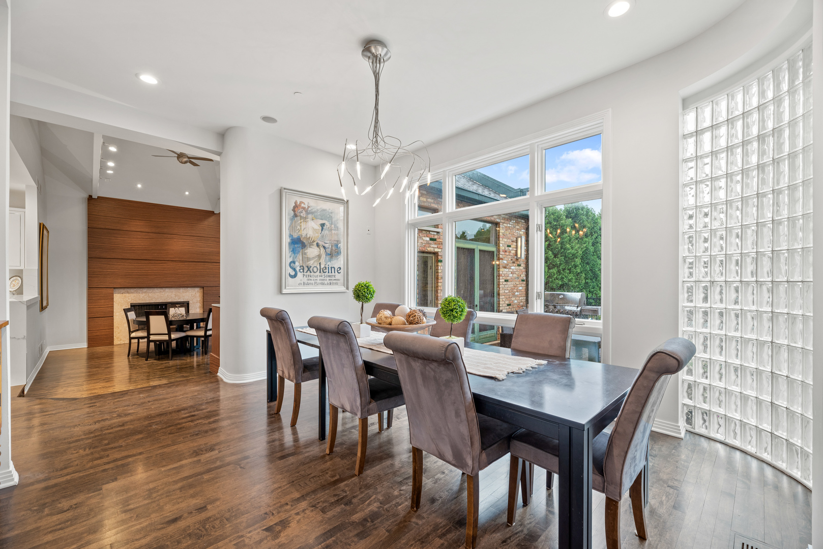 780 Bob-O-Link Road Highland Park, IL 60035 - Photo 13 of 50 a view of a dining room with furniture window and wooden floor