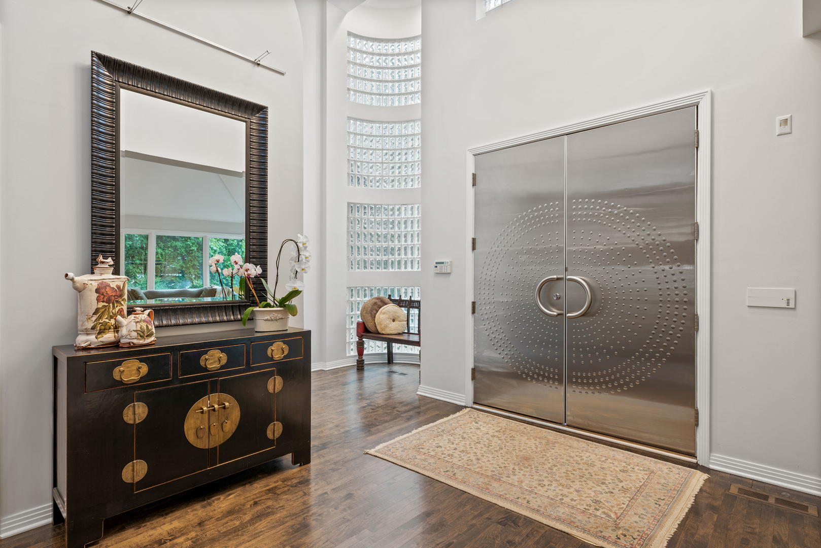 780 Bob-O-Link Road Highland Park, IL 60035 - Photo 3 of 50 a kitchen with granite countertop a stove and a wooden floor