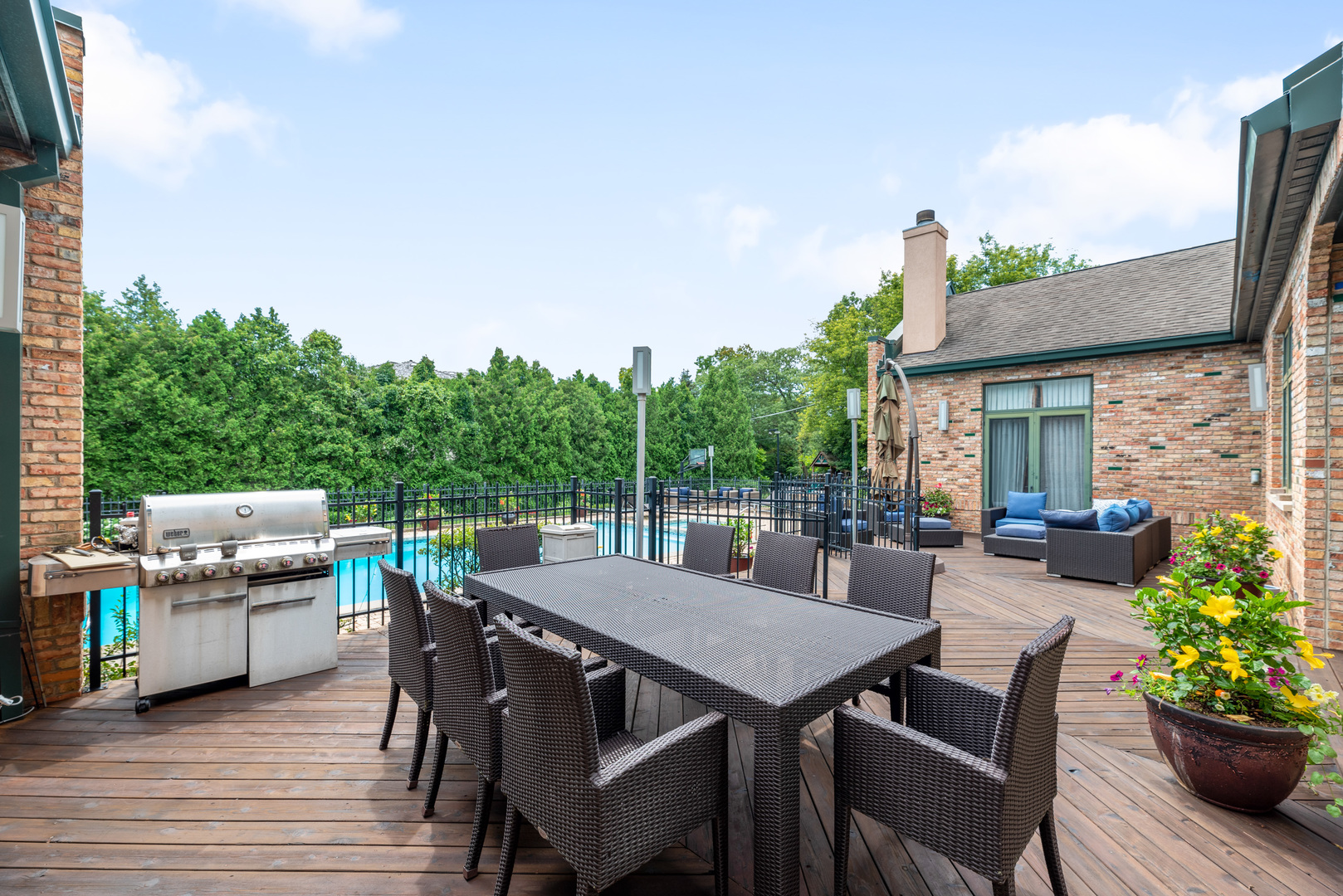 780 Bob-O-Link Road Highland Park, IL 60035 - Photo 38 of 50 a view of a patio with table and chairs with wooden floor and fence