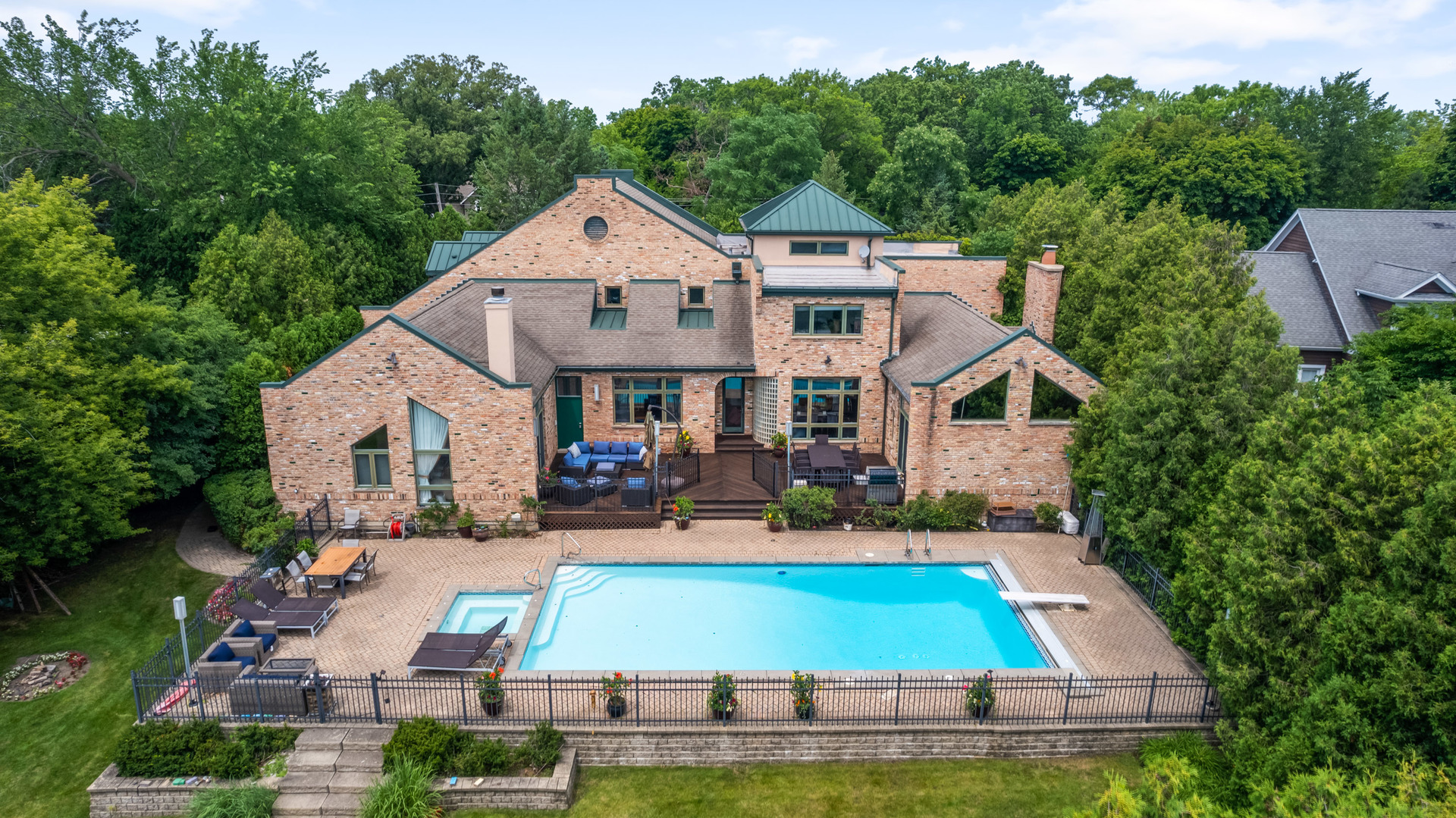 780 Bob-O-Link Road Highland Park, IL 60035 - Photo 42 of 50 a view of house with yard outdoor seating and swimming pool