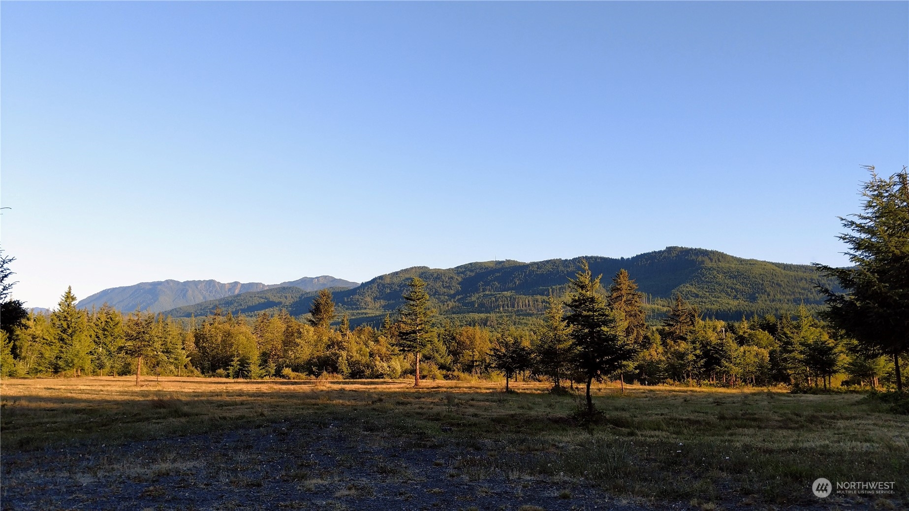 a view of a town with mountain view