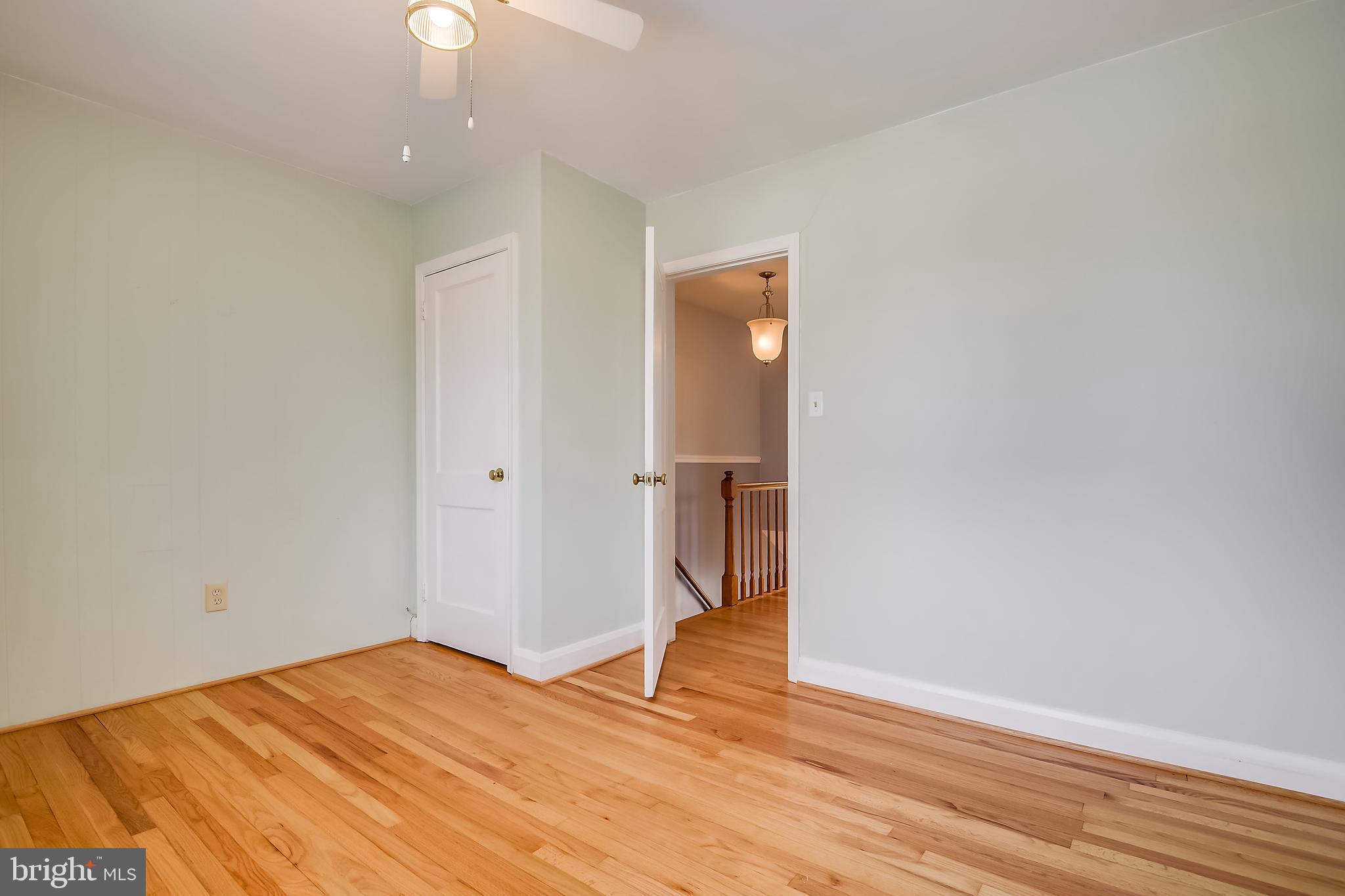 1622 Myamby Road Baltimore, MD 21286 - Photo 13 of 28 a view of empty room with wooden floor