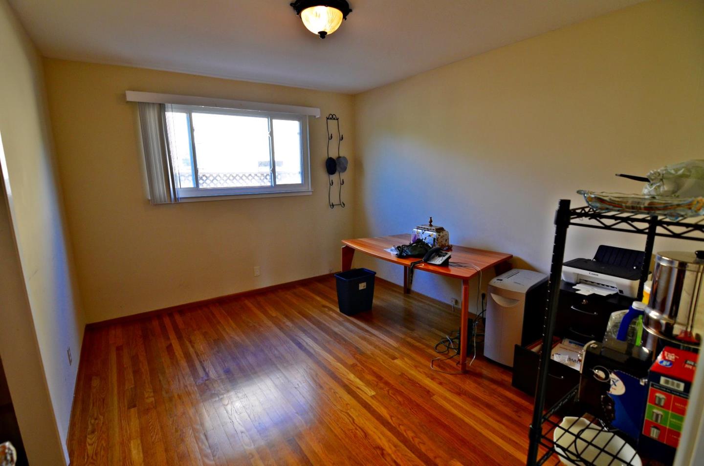 1920 Waycross Road Fremont, CA 94539 - Photo 11 of 13 a room with wooden floor and furniture