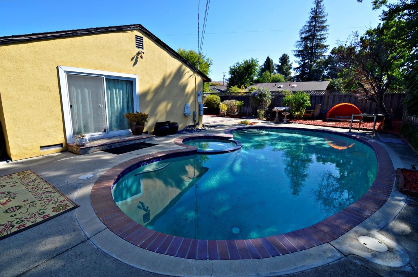 1920 Waycross Road Fremont, CA 94539 - Photo 3 of 13 a view of a swimming pool with a patio