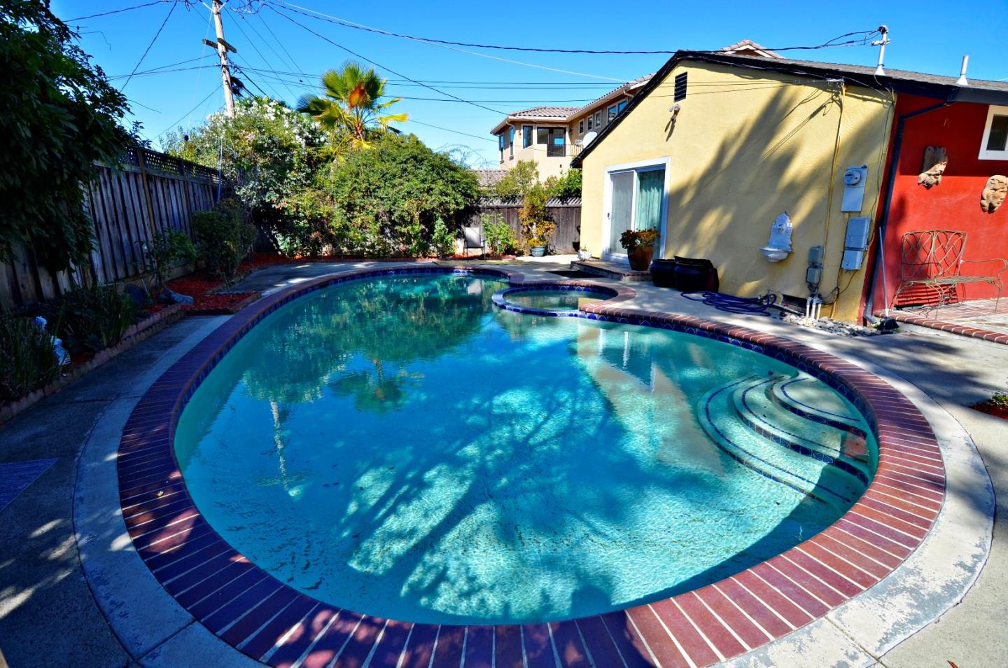 1920 Waycross Road Fremont, CA 94539 - Photo 4 of 13 a view of a swimming pool with a patio