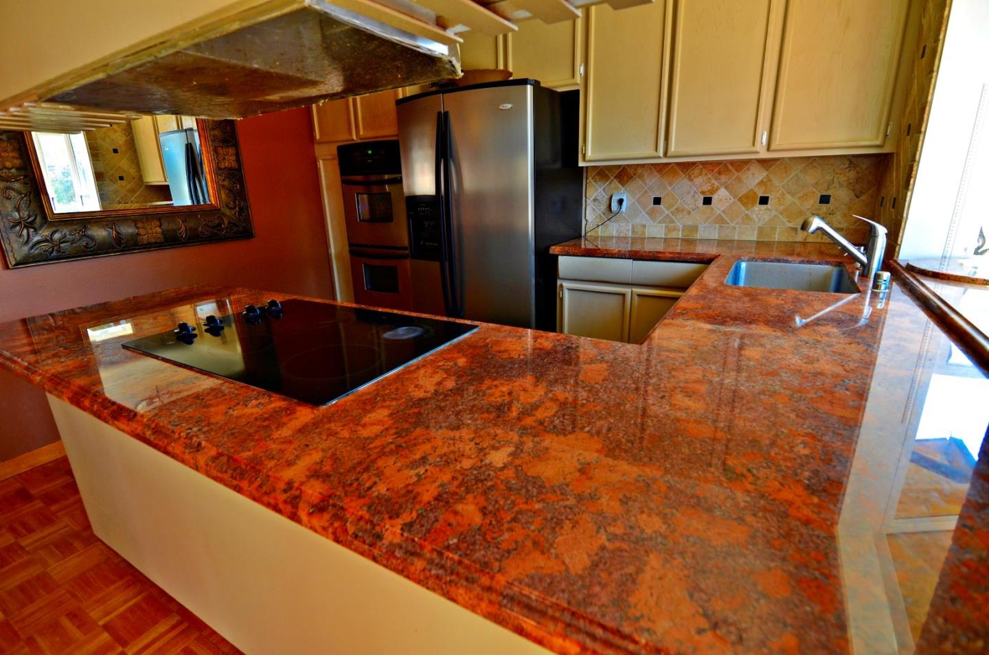 1920 Waycross Road Fremont, CA 94539 - Photo 8 of 13 a kitchen with granite countertop a sink a stove and refrigerator