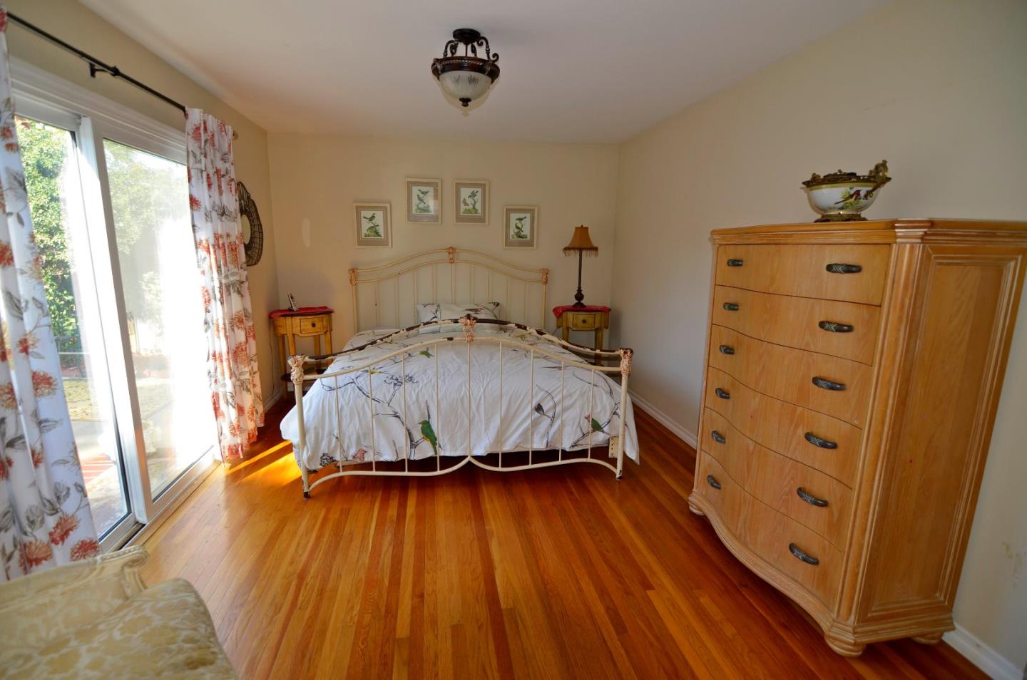 1920 Waycross Road Fremont, CA 94539 - Photo 9 of 13 a bedroom with a bed and wooden floor