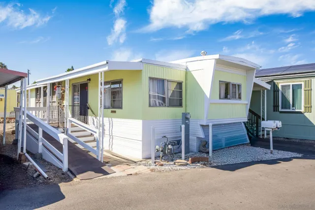 a front view of house with yard