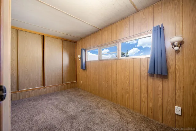 a view of room with closet and natural light