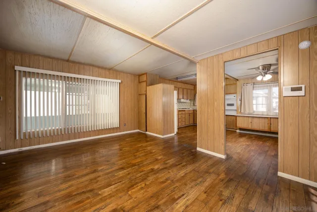 a view of a livingroom with wooden floor