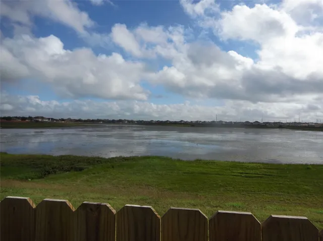 a view of a balcony with lake view