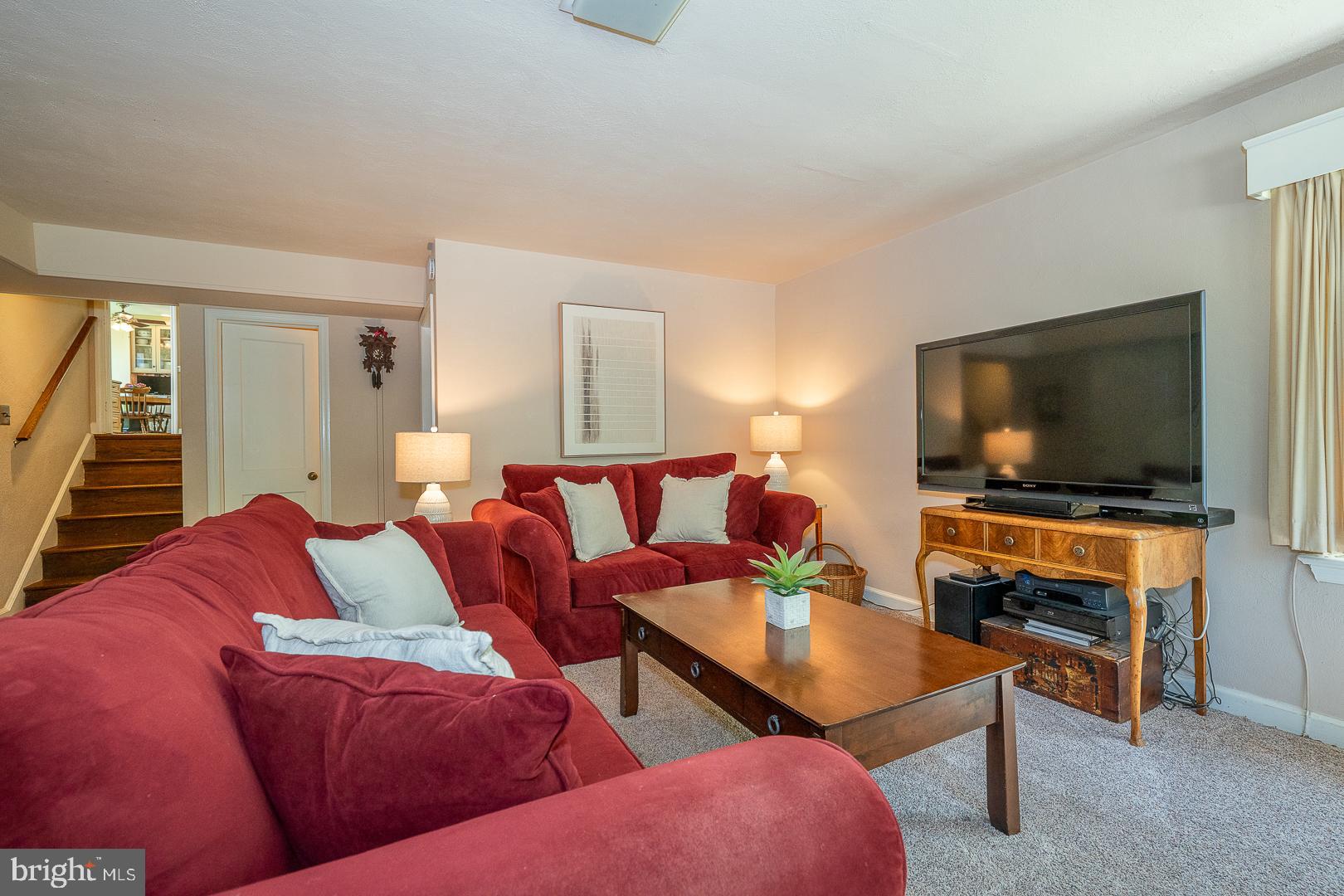 658 Conestoga Road Villanova, PA 19085 - Photo 46 of 57 a living room with furniture and a flat screen tv