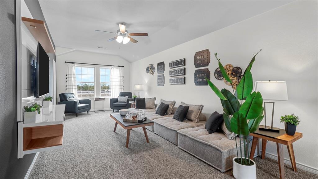 2000 Foggy Wds Lane Anna, TX 75409 - Photo 15 of 40 a living room with furniture and a potted plant