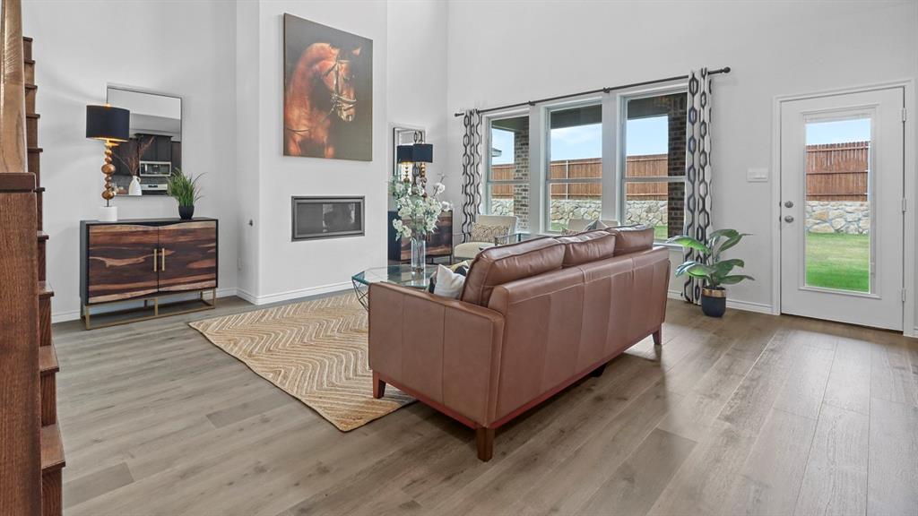 2000 Foggy Wds Lane Anna, TX 75409 - Photo 31 of 40 a living room with furniture and a large window