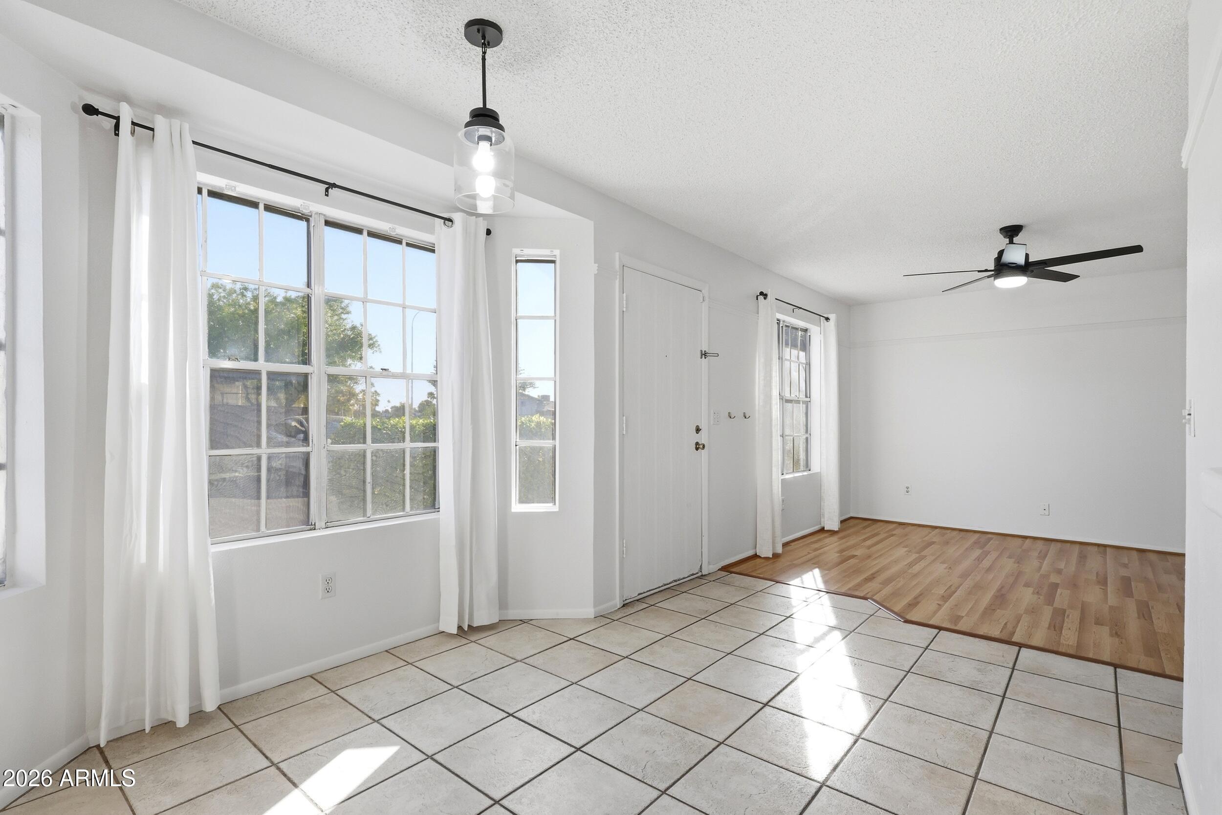 1033 East Bendix Drive Tempe, AZ 85283 - Photo 2 of 31 a view of empty room with windows