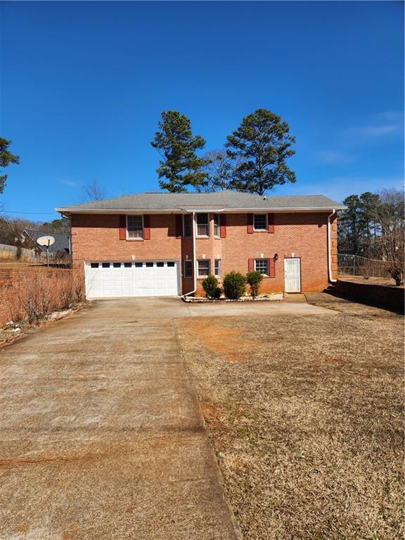 3258 Old Salem Road Southeast Conyers, GA 30013 - Photo 1 of 38 a view of a garage