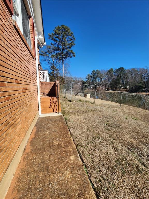 3258 Old Salem Road Southeast Conyers, GA 30013 - Photo 13 of 38 a view of a backyard