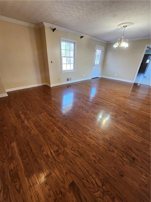 3258 Old Salem Road Southeast Conyers, GA 30013 - Photo 17 of 38 an empty room with wooden floor and window