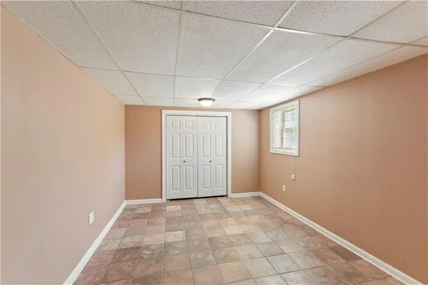 a view of main area fire place window and wooden floor