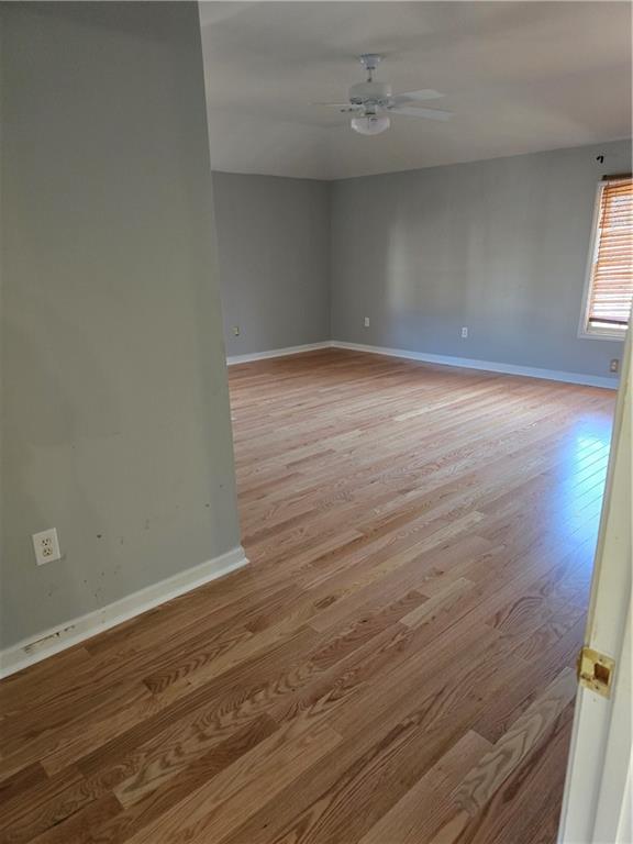 3258 Old Salem Road Southeast Conyers, GA 30013 - Photo 30 of 38 wooden floor in an empty room