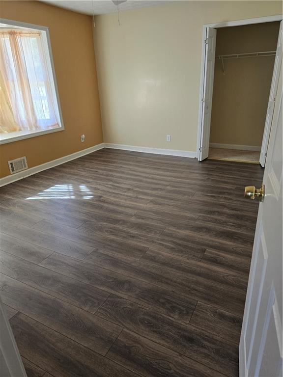 3258 Old Salem Road Southeast Conyers, GA 30013 - Photo 32 of 38 a view of room with window and hardwood floor