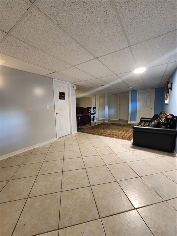 3258 Old Salem Road Southeast Conyers, GA 30013 - Photo 4 of 38 a kitchen with granite countertop a rug and a stove
