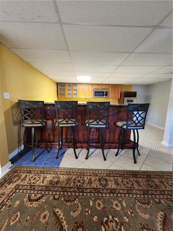 3258 Old Salem Road Southeast Conyers, GA 30013 - Photo 7 of 38 a view of a dining room with furniture