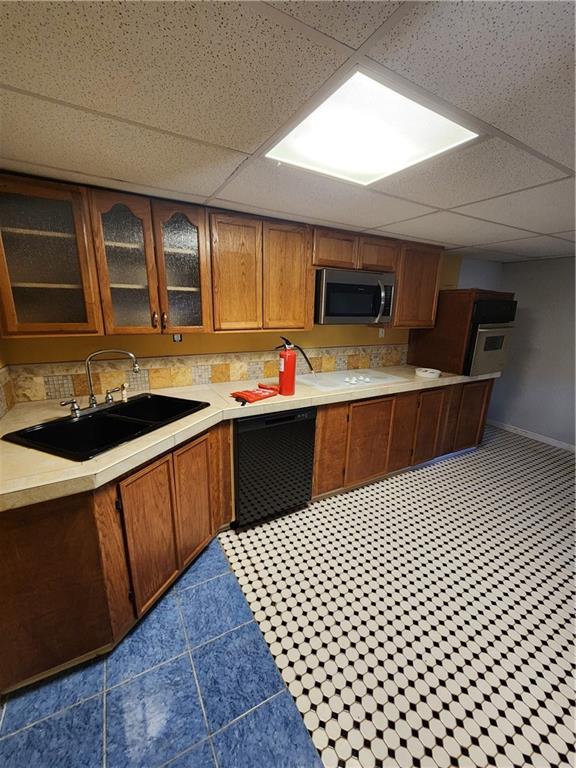 3258 Old Salem Road Southeast Conyers, GA 30013 - Photo 9 of 38 a kitchen with a sink and cabinets
