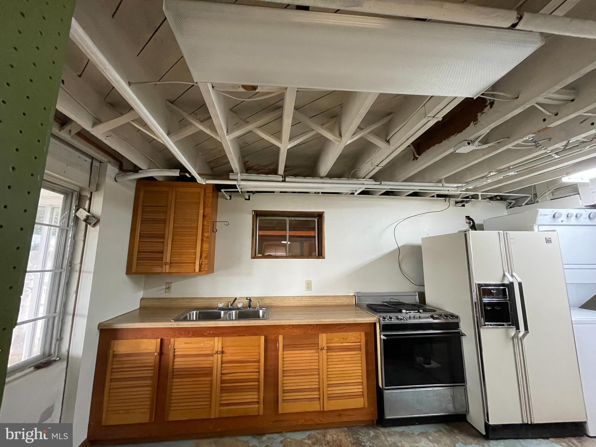 231 Cape St John Road Annapolis, MD 21401 - Photo 26 of 39 Kitchen in basement used for steaming crabs