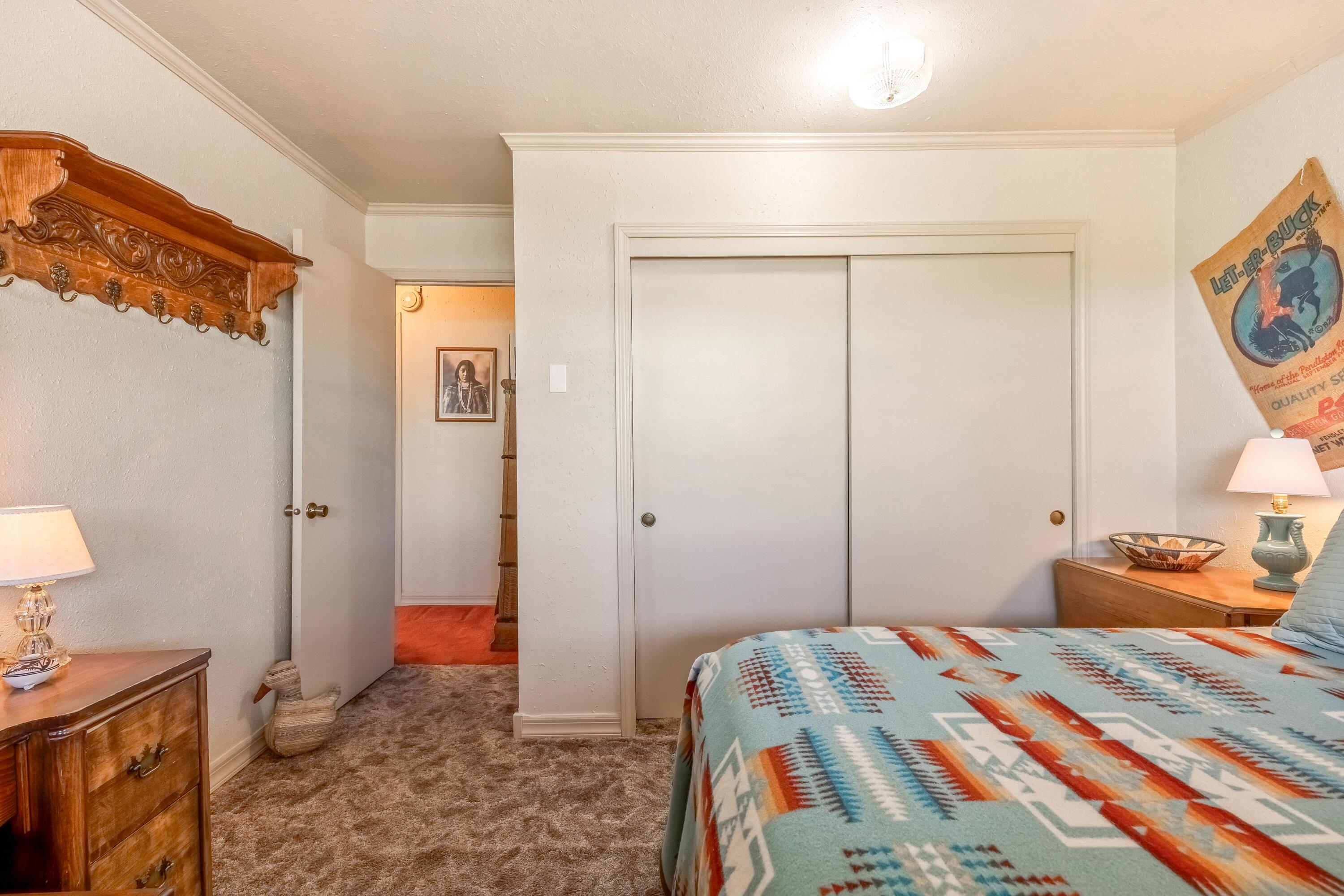25887 Weberg Road Paulina, OR 97751 - Photo 15 of 46 a bedroom with a bed and a window