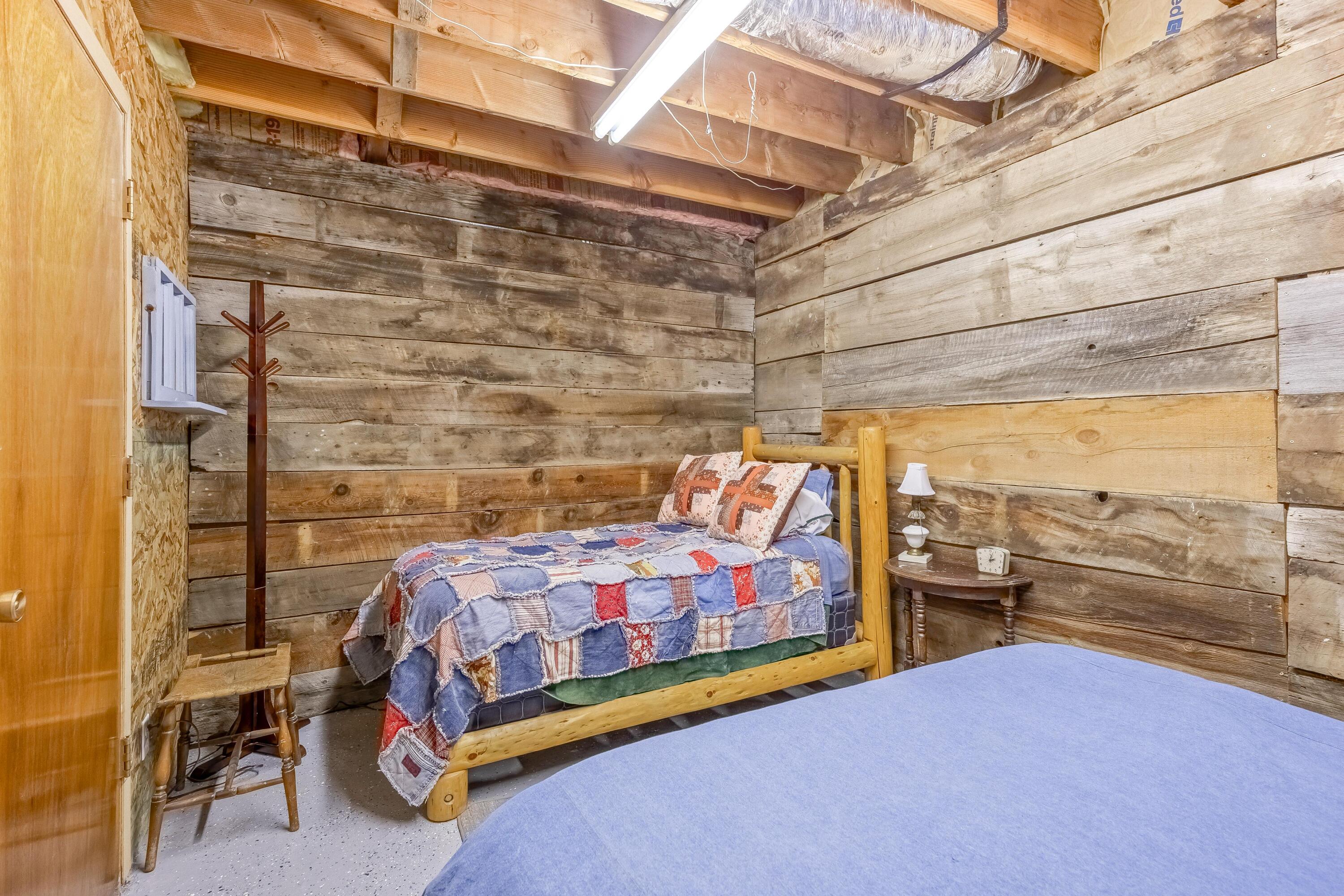 25887 Weberg Road Paulina, OR 97751 - Photo 24 of 46 a bedroom with a bed and large window