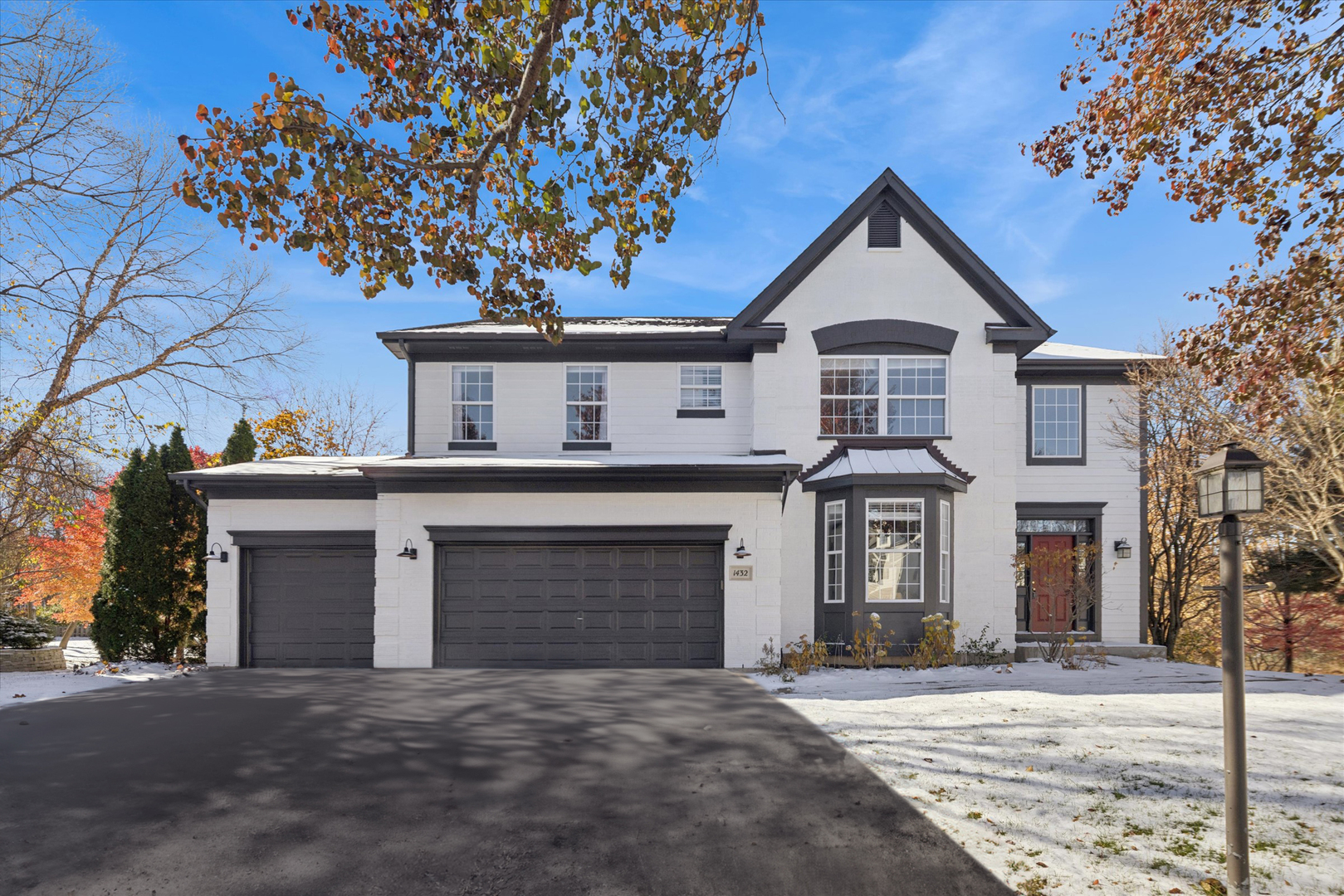front view of a house with a street