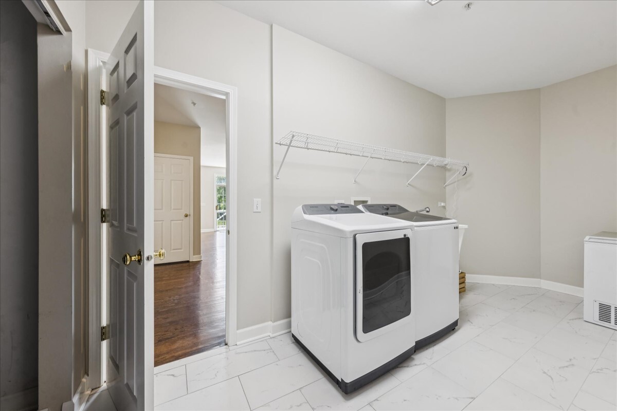 1432 Cascade Lane Barrington, IL 60010 - Photo 16 of 45 a utility room with washer and dryer