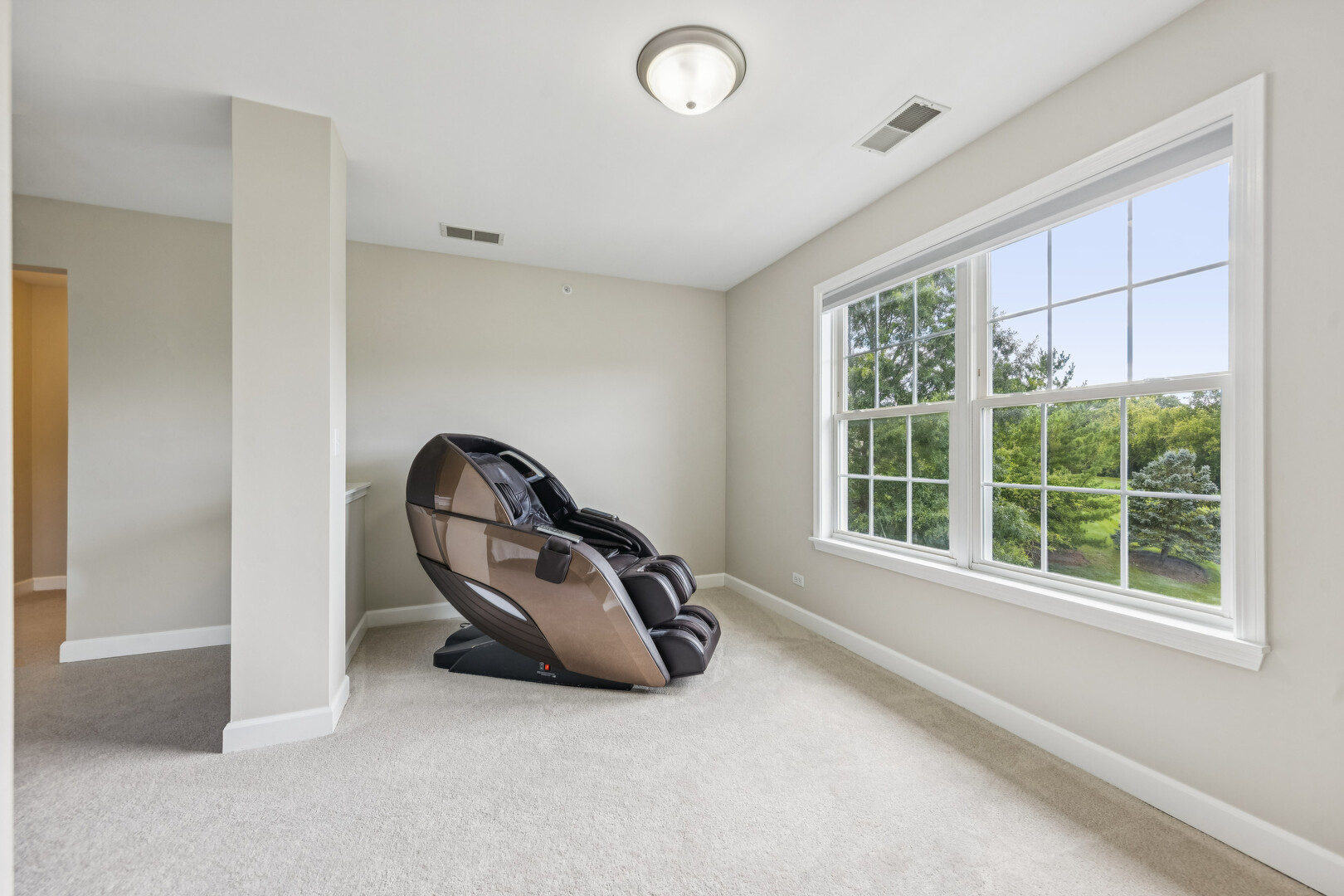 1432 Cascade Lane Barrington, IL 60010 - Photo 19 of 45 a room with a bed and a large window
