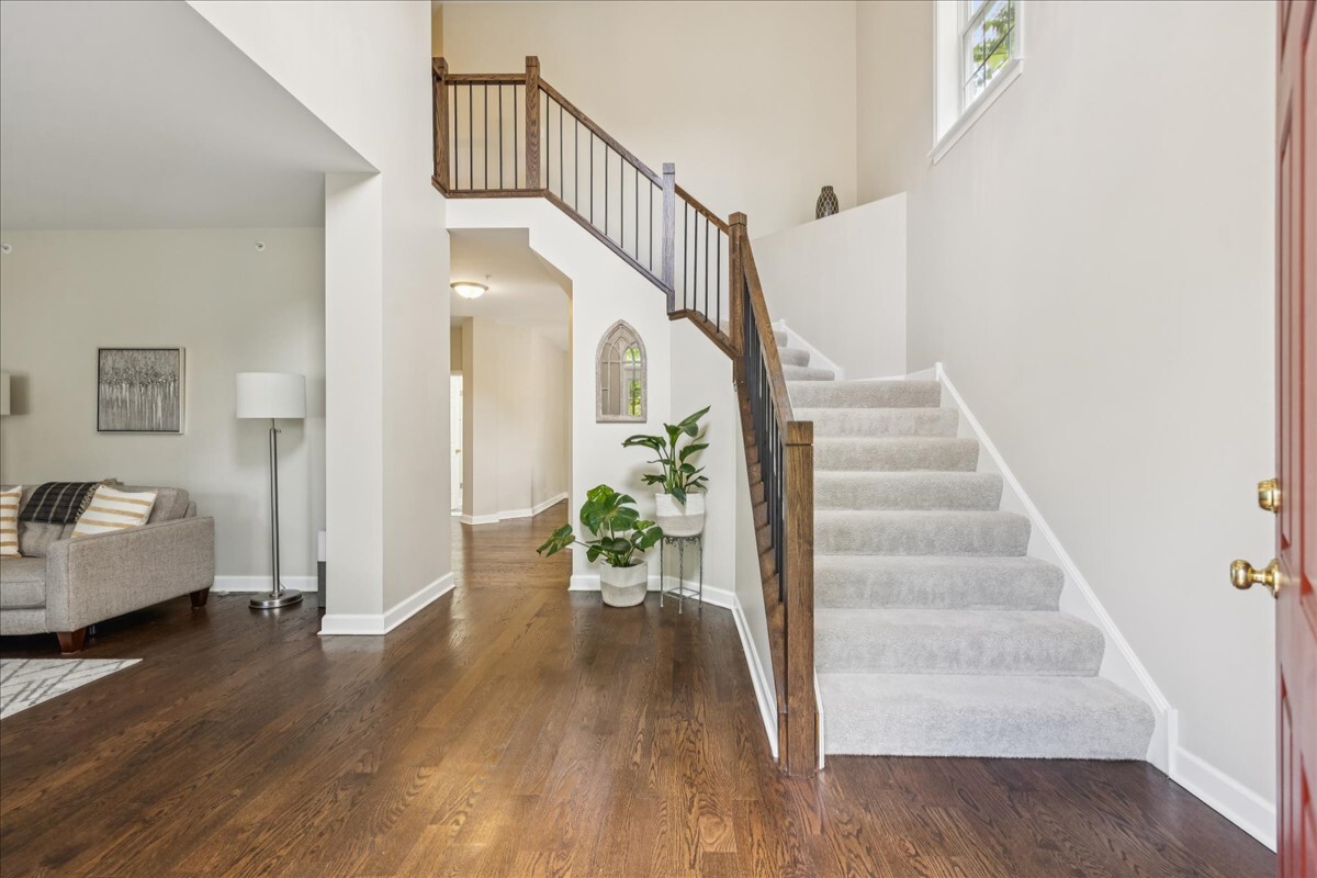 1432 Cascade Lane Barrington, IL 60010 - Photo 2 of 45 a view of entryway and hall with wooden floor