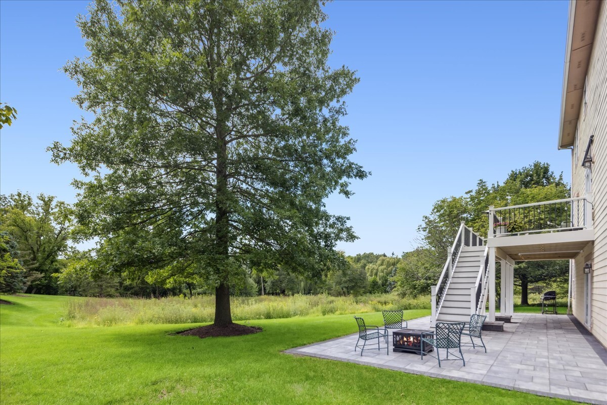 1432 Cascade Lane Barrington, IL 60010 - Photo 39 of 45 a view of a chair and table in the garden