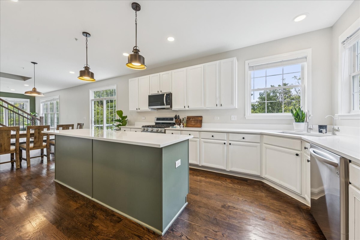 1432 Cascade Lane Barrington, IL 60010 - Photo 9 of 45 a kitchen with a sink window and cabinets