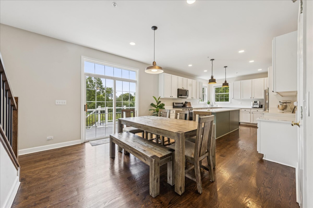 1432 Cascade Lane Barrington, IL 60010 - Photo 10 of 45 a view of a kitchen with dining table and chairs