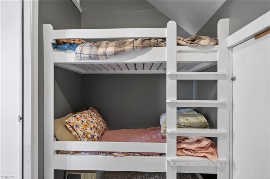 4913 Golden Oaks Drive Oak Ridge, NC 27310 - Photo 34 of 45 This space is not included in heated square footage.