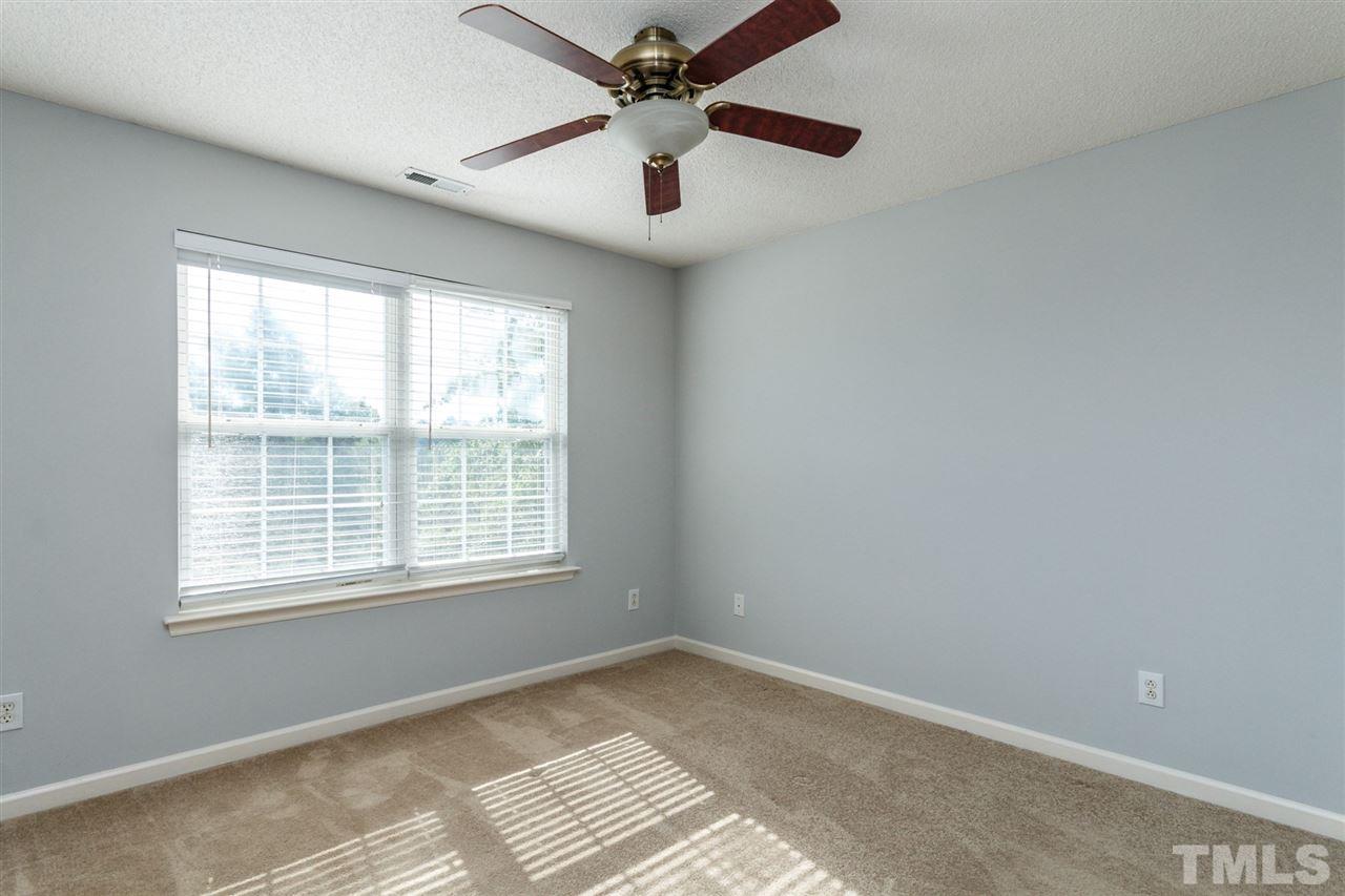 5006 Gable Ridge Drive Durham, NC 27713 - Photo 14 of 24 a view of an empty room with a window