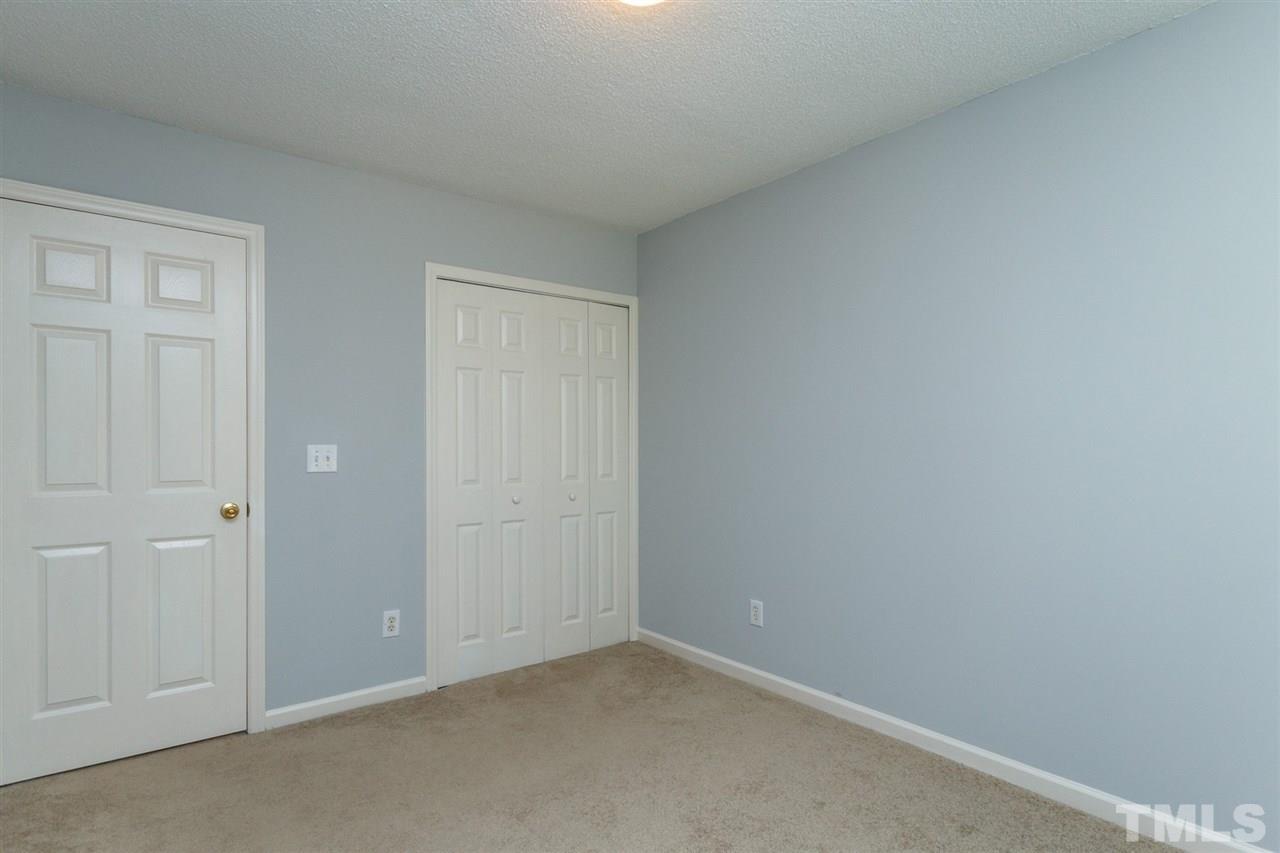 5006 Gable Ridge Drive Durham, NC 27713 - Photo 17 of 24 an empty room with windows