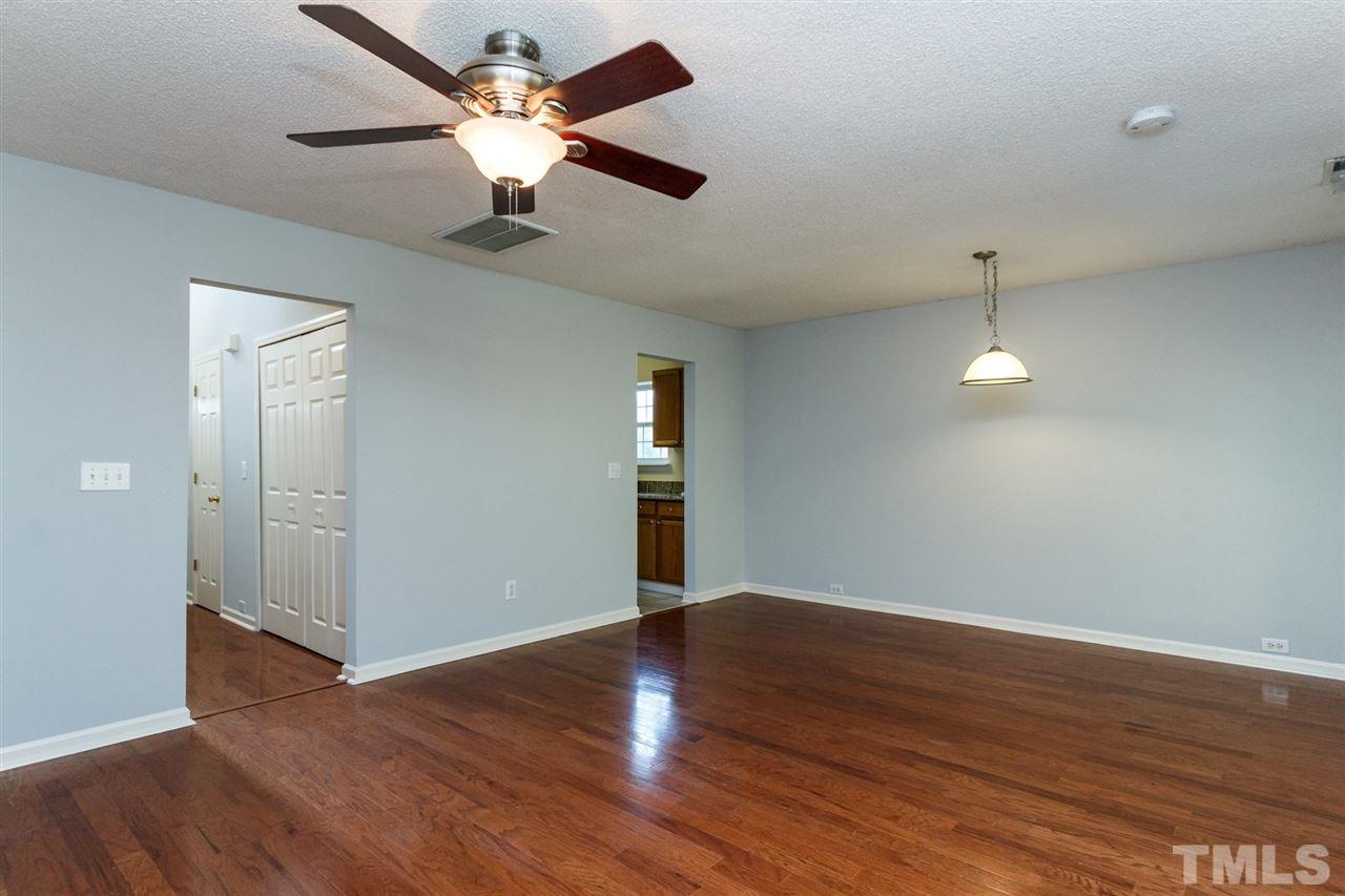 5006 Gable Ridge Drive Durham, NC 27713 - Photo 10 of 24 a view of empty room with wooden floor