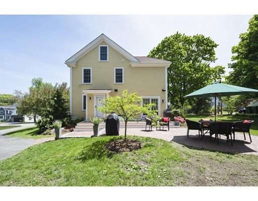 471 Chestnut Street Needham, MA 02492 - Photo 14 of 20 a view of a house with a yard patio and sitting area