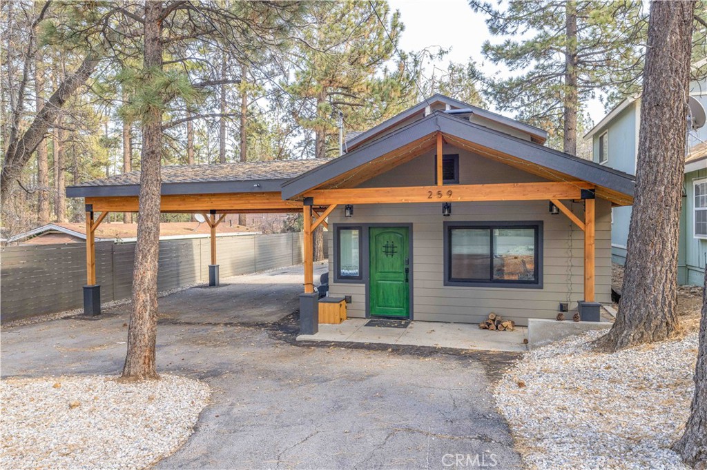 a front view of a house with a porch