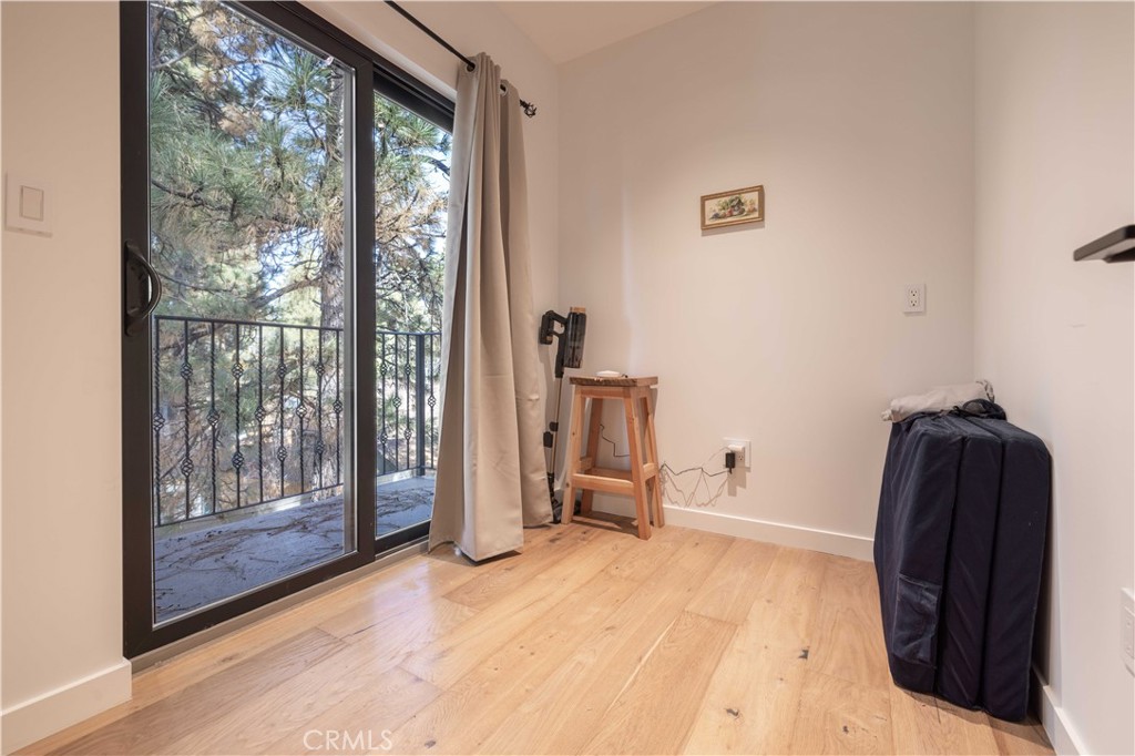 259 Victoria Sugarloaf, CA 92386 - Photo 24 of 32 a view of livingroom with furniture and floor to ceiling window