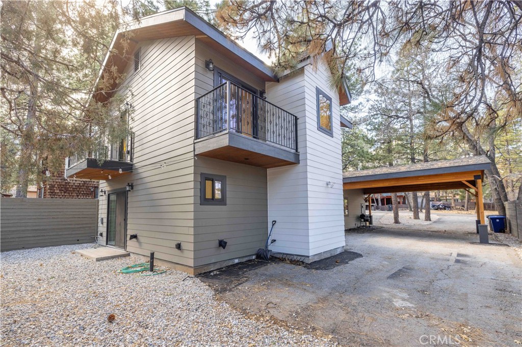 259 Victoria Sugarloaf, CA 92386 - Photo 26 of 32 a view of a house with a garage